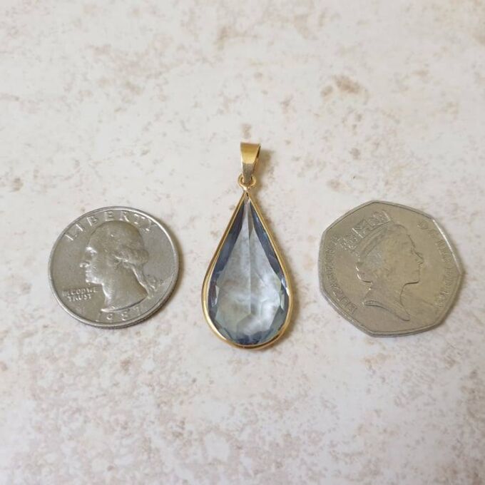 Huge Synthetic Spinel Pear Pendant in 18ct Gold.