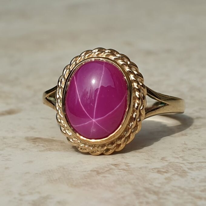 Synthetic Star Pink Ruby Ring in 9ct Gold.