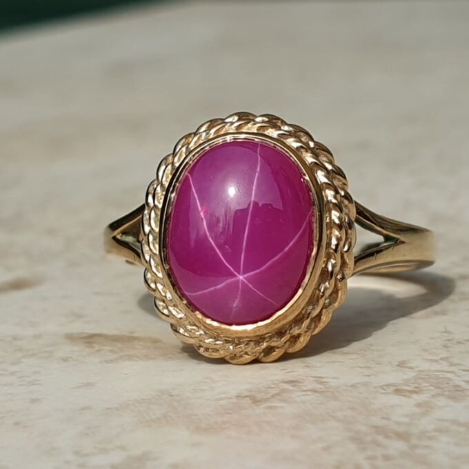 Synthetic Star Pink Ruby Ring in 9ct Gold.