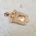 Shield Medallion in 9ct Gold.