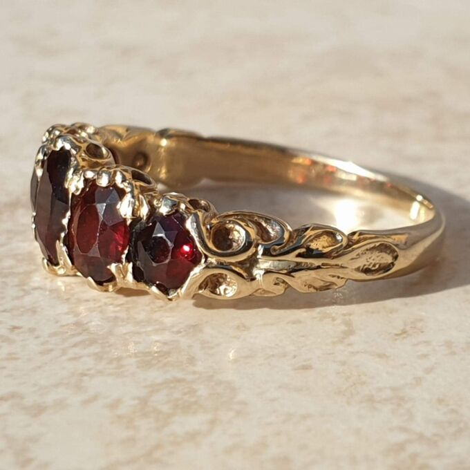 Graduating Five Stone Garnet Ring in 9ct Gold,  a UK N 1/2 or a US almost 7 1/4.