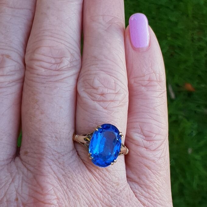 Eye-catching Blue Paste Solitaire in 9ct Gold, a UK P 1/2 or a US 8 1/4.