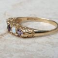 Amethyst and Opal Five Stone Ring in 9ct Gold, a UK O 1/2 or a US 7 1/2.