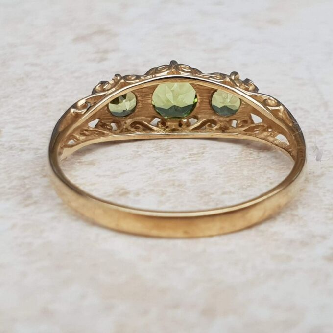 Summery Peridot Three Stone Ring in 9ct Gold, a UK N 1/2 or a US 7 1/4.