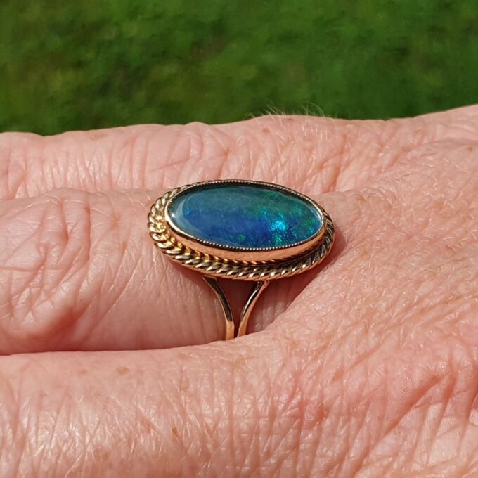 Oval Opal Doublet Ring in 9ct gold, a UK O or a US 7 1/2
