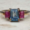 Topaz and Synthetic Ruby Trilogy Ring in 9ct Gold.