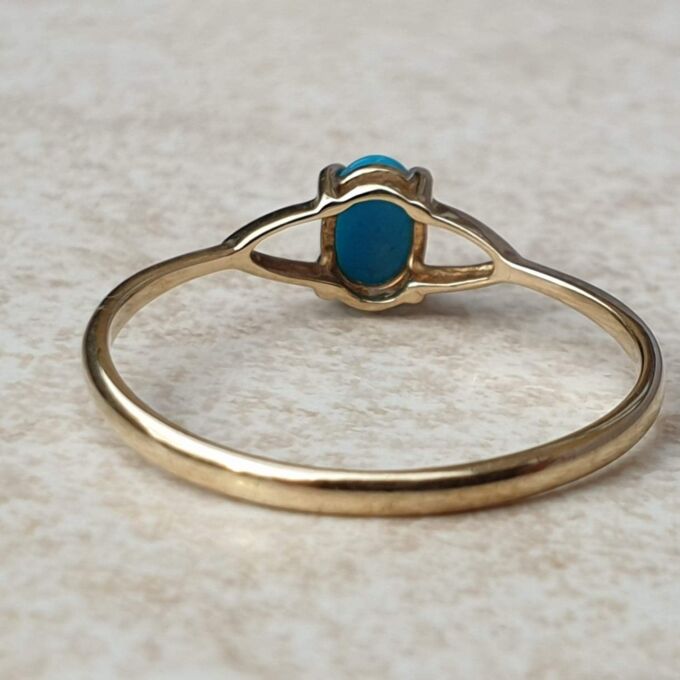 Turquoise Coloured Cabochon in 9ct Gold,  a UK O or a US 7 1/2.