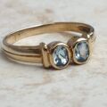 Torque Style Topaz Ring in 9ct Gold,  a UK M or a US 6 1/2.