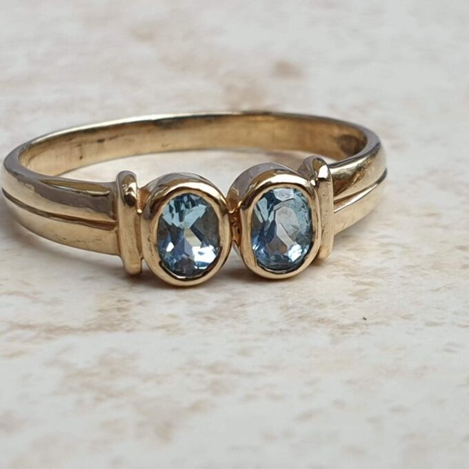 Torque Style Topaz Ring in 9ct Gold,  a UK M or a US 6 1/2.