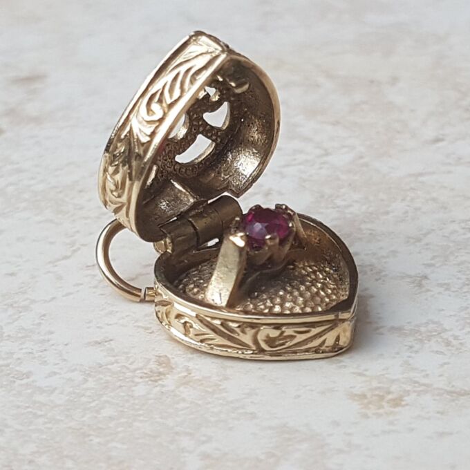 Truly Fabulous Heart Locket Secret Ruby Ring in 9ct Gold