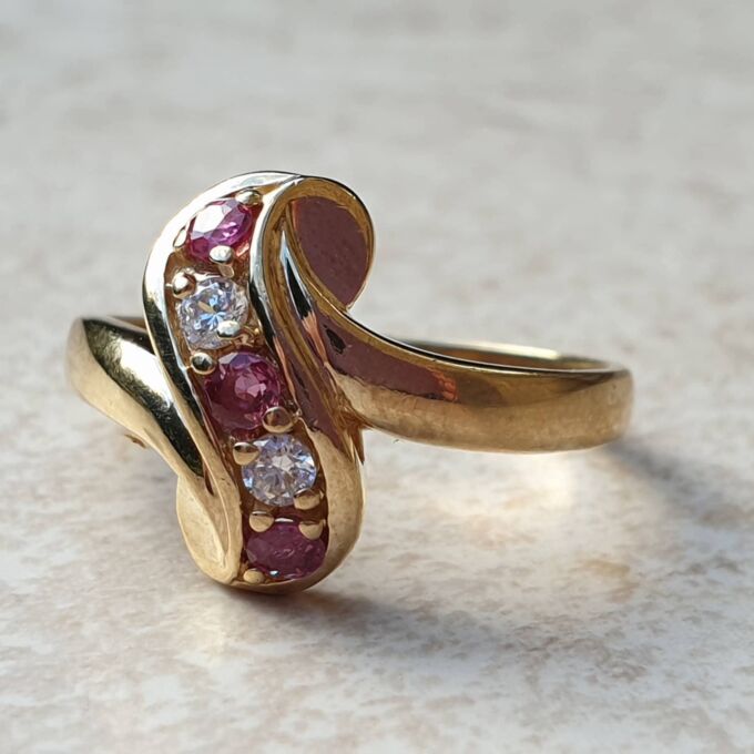 Ruby & Paste Scroll Ring in 9ct Gold.
