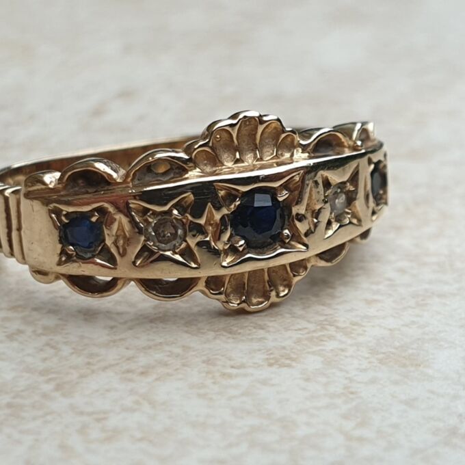 Sapphire and Diamond Ring in 9ct Gold,  a UK L 1/2 or a US 6 1/4.