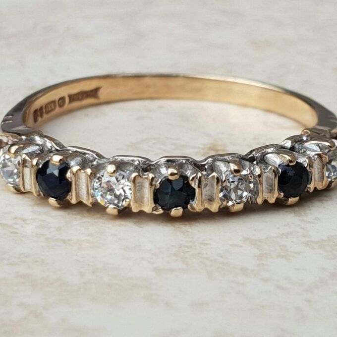Sapphire & CZ Half Eternity Ring in 9ct Gold, a UK O or a US 7 1/2.