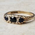 Three Stone Sapphire Ring with Diamonds in 9ct Gold, a UK O 1/2 or a US 7 1/2.