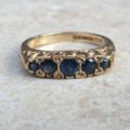 Blue Sapphire Five Stone Ring in 9ct Yellow Gold, a UK K 1/2 or a US 5 3/4.