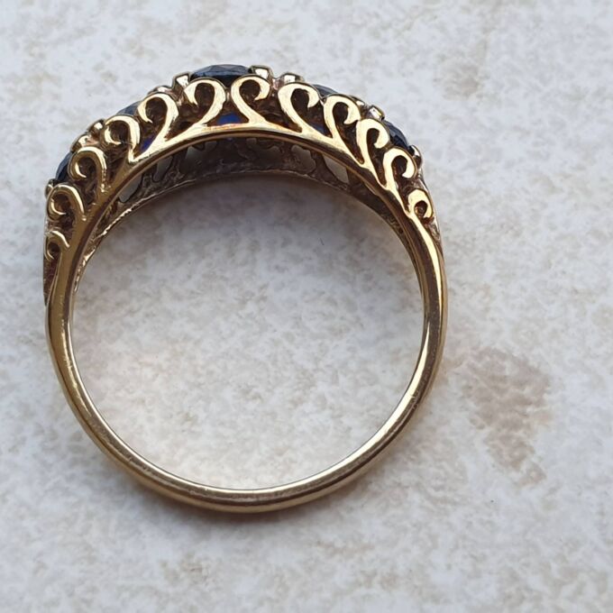 Vibrant Blue Five Stone Synthetic Sapphire Ring in 9ct Gold, a UK N or a US 7.