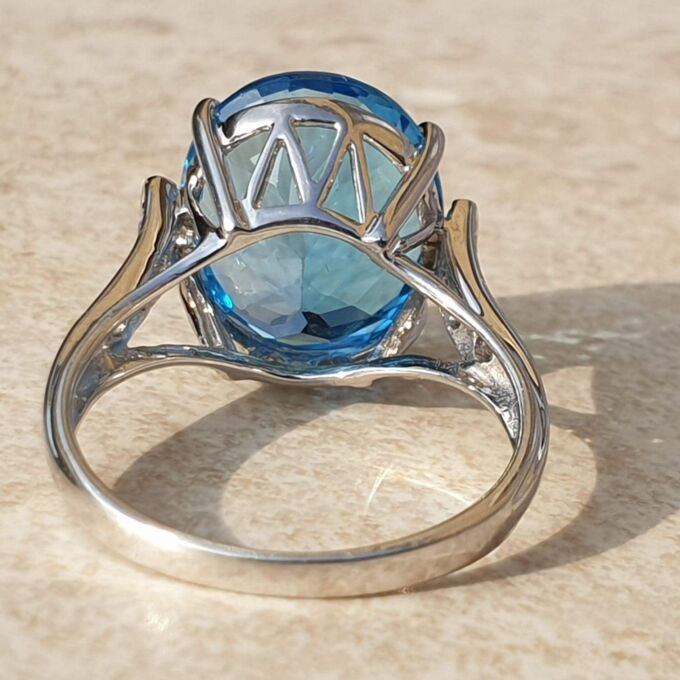 Swiss Blue Topaz Solitaire Ring in 9ct White Gold,  a UK N 1/2 or a US 7 1/4.