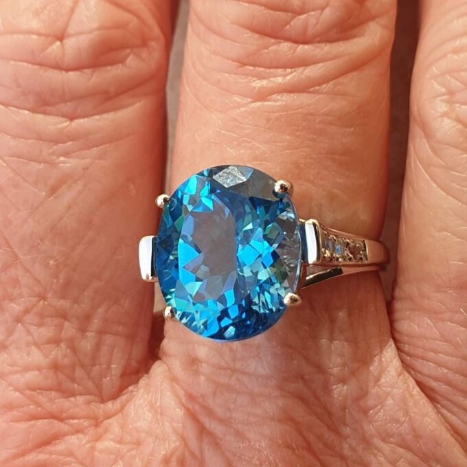 Swiss Blue Topaz Solitaire Ring in 9ct White Gold,  a UK N 1/2 or a US 7 1/4.