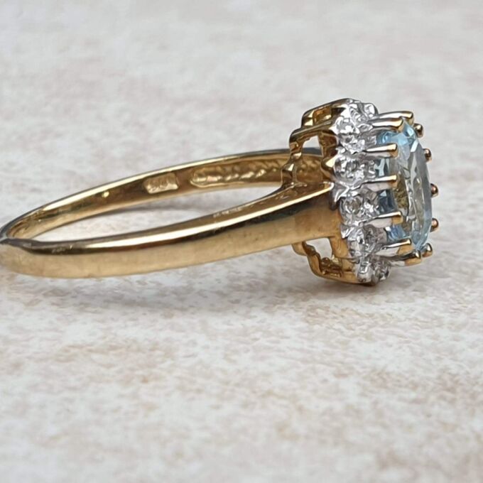 Aquamarine and Diamond Cluster Ring in 9ct Gold,  a UK M 1/2 or a US 6 3/4.