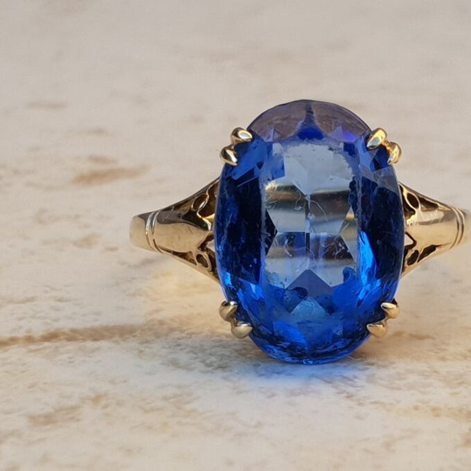 Eye-catching Blue Paste Solitaire in 9ct Gold, a UK P 1/2 or a US 8 1/4.