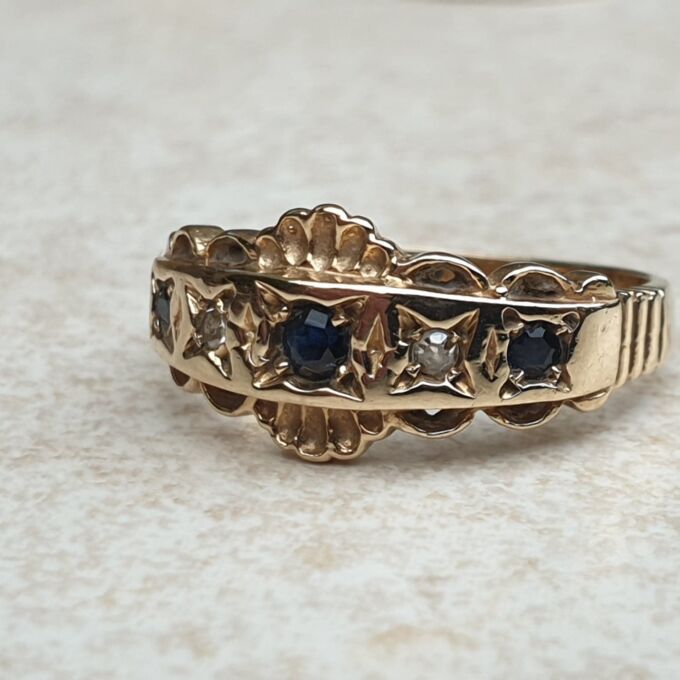 Sapphire and Diamond Ring in 9ct Gold,  a UK L 1/2 or a US 6 1/4.