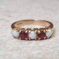 Opal and Garnet Ring in 9ct Gold, a UK J or a US 5