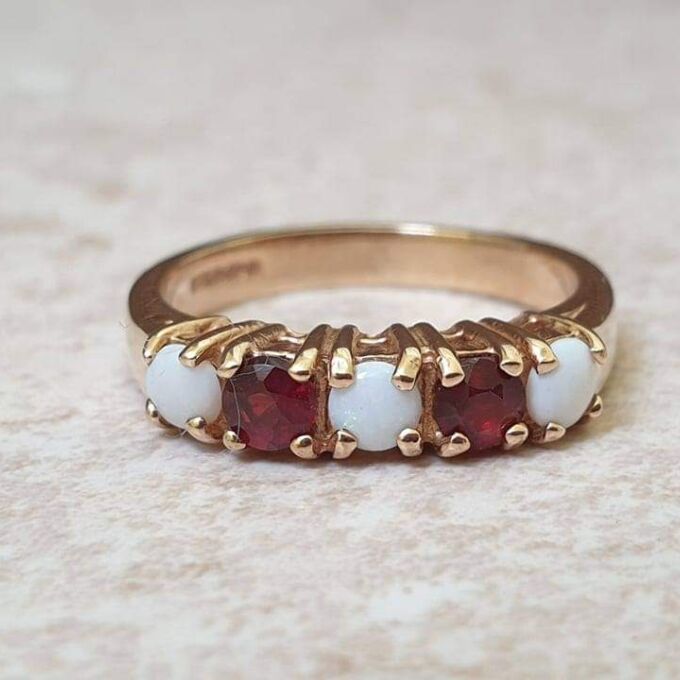 Opal and Garnet Ring in 9ct Gold, a UK J or a US 5