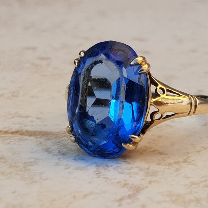 Eye-catching Blue Paste Solitaire in 9ct Gold, a UK P 1/2 or a US 8 1/4.