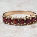 Seven Stone Garnet Band in 9ct Gold, a UK L 1/2 or a US 6