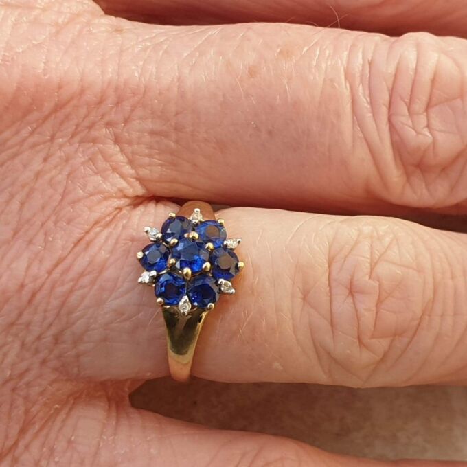 Tanzanite And Diamond Cluster Ring in 9ct Gold,  a UK J 1/2 or a US 5 1/4.