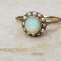 Stunning Opal and Split Pearl Halo Ring in 9ct Gold, a UK L 1/2 or a US 6 1/4.