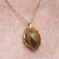 Striking Tigers Eye Pendant in 9ct Gold.