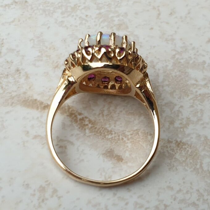 Opal & Ruby Ring in 9ct Gold, a UK O or a US 7 1/2