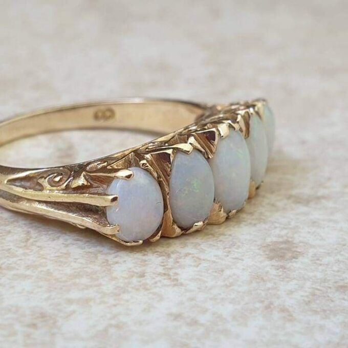 Graduating Five Stone Opal Ring in 9ct Gold, a UK O or a US 7 1/4