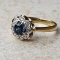 Sapphire and Diamond Daisy Ring in 18ct Gold,  a UK J or a US 5.