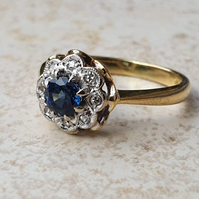Sapphire and Diamond Daisy Ring in 18ct Gold,  a UK J or a US 5.