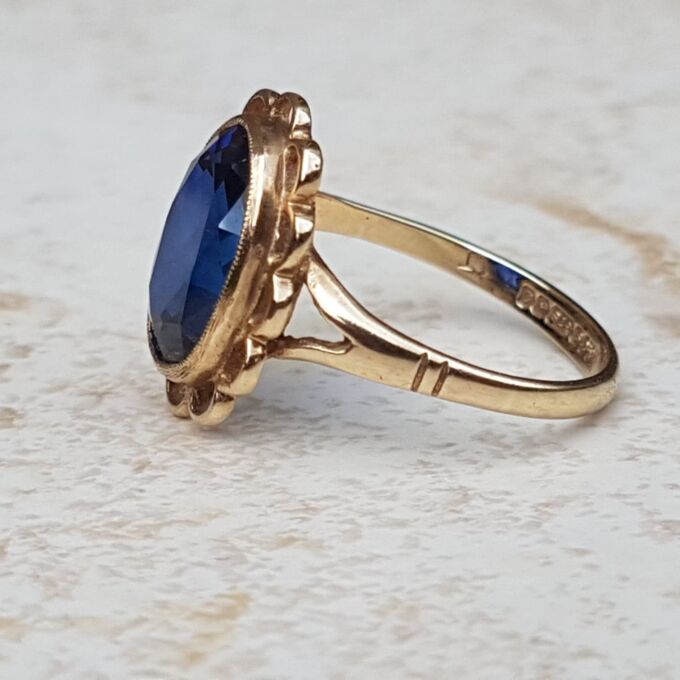 Synthetic Sapphire Solitaire Ring in 9ct Gold, a UK K or a US 5 3/4.