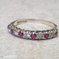 Ruby Half Eternity Stacking Band in Silver.