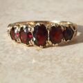 Graduating Five Stone Garnet Ring in 9ct Gold,  a UK N 1/2 or a US almost 7 1/4.