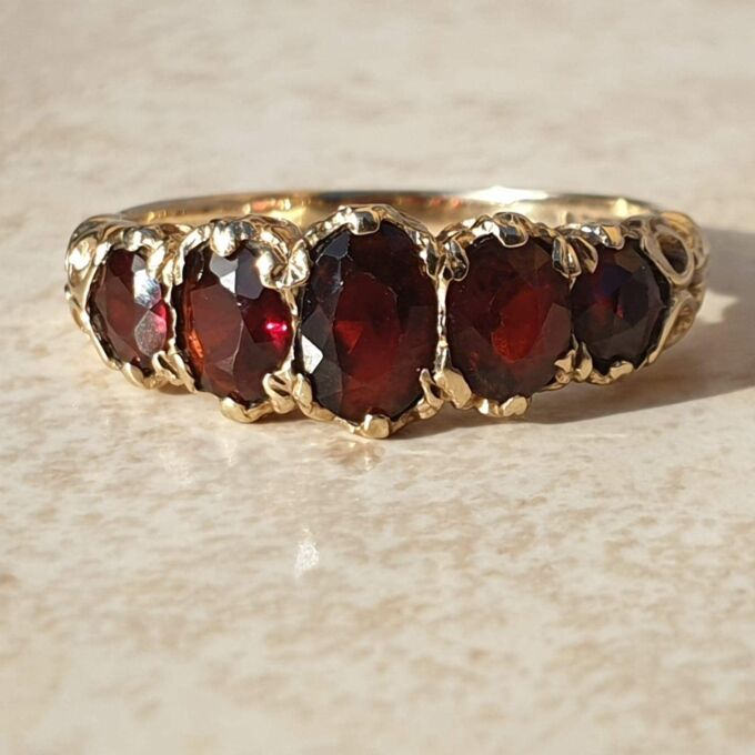 Graduating Five Stone Garnet Ring in 9ct Gold,  a UK N 1/2 or a US almost 7 1/4.