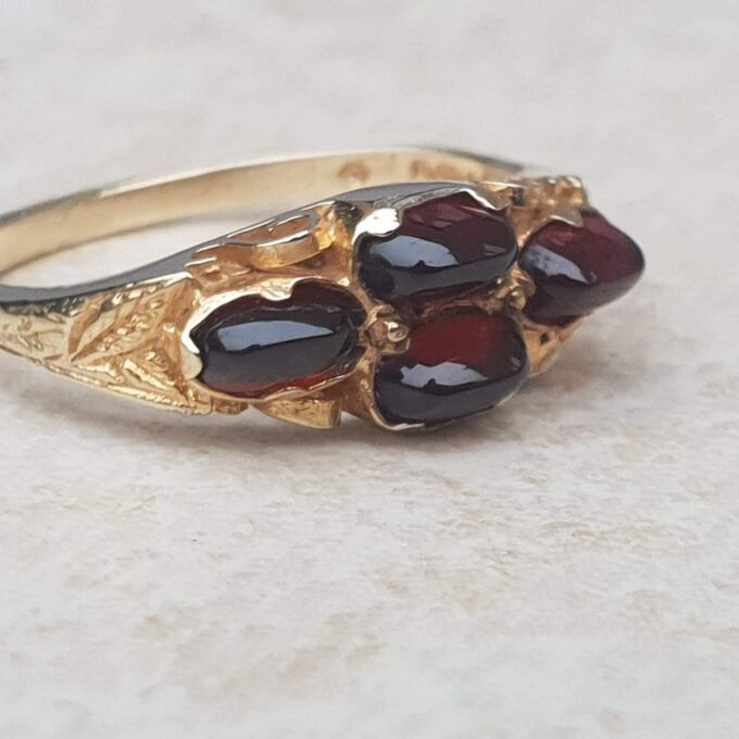 Garnet Cabochon Ring in 9ct Gold,  a UK N 1/2 or a US 7.
