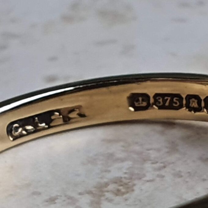 Opal and Garnet Ring in 9ct Gold, a UK N or a US 7