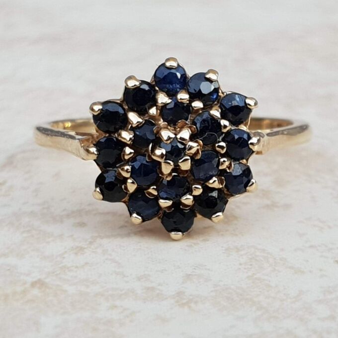 Synthetic Sapphire Cluster Ring in 9ct Gold, a UK M 1/2 or a US 6 3/4.