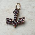 Delightful Garnet Set Anchor Pendant
