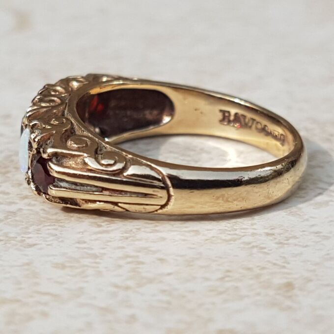 Five Stone Opal and Garnet 9ct Gold Ring, a UK K 1/2 or a US size 5 3/4.