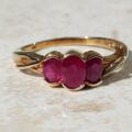 Ravishing Synthetic Ruby Three Stone Trilogy 9ct Gold Ring