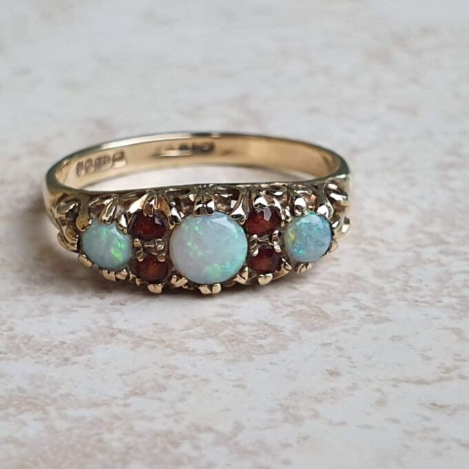 Opal and Garnet Ring in 9ct Gold, a UK N or a US 7
