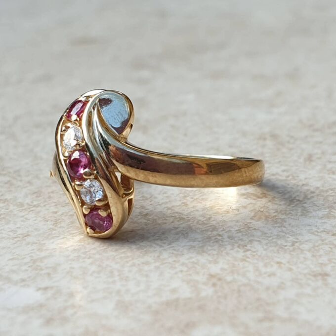 Ruby & Paste Scroll Ring in 9ct Gold.