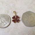 Garnet Four Leaf Clover Pendant in 9ct Gold