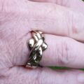 Four Piece Puzzle Ring in 9ct Gold, a UK N 1/2 or a US 7 1/2